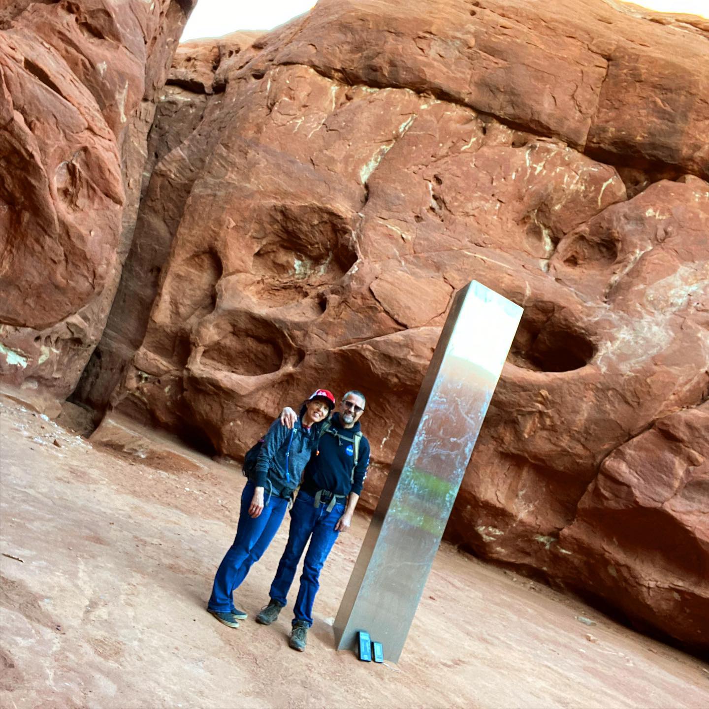 anthony and Stephanie at the mYsterious Utah Monolith