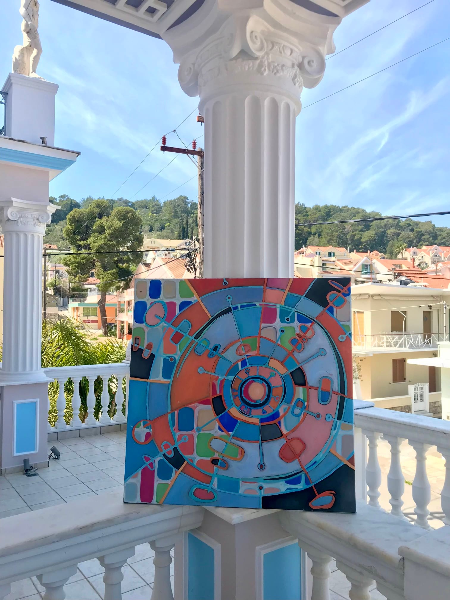cosmic clock painting by holly troy in Greece