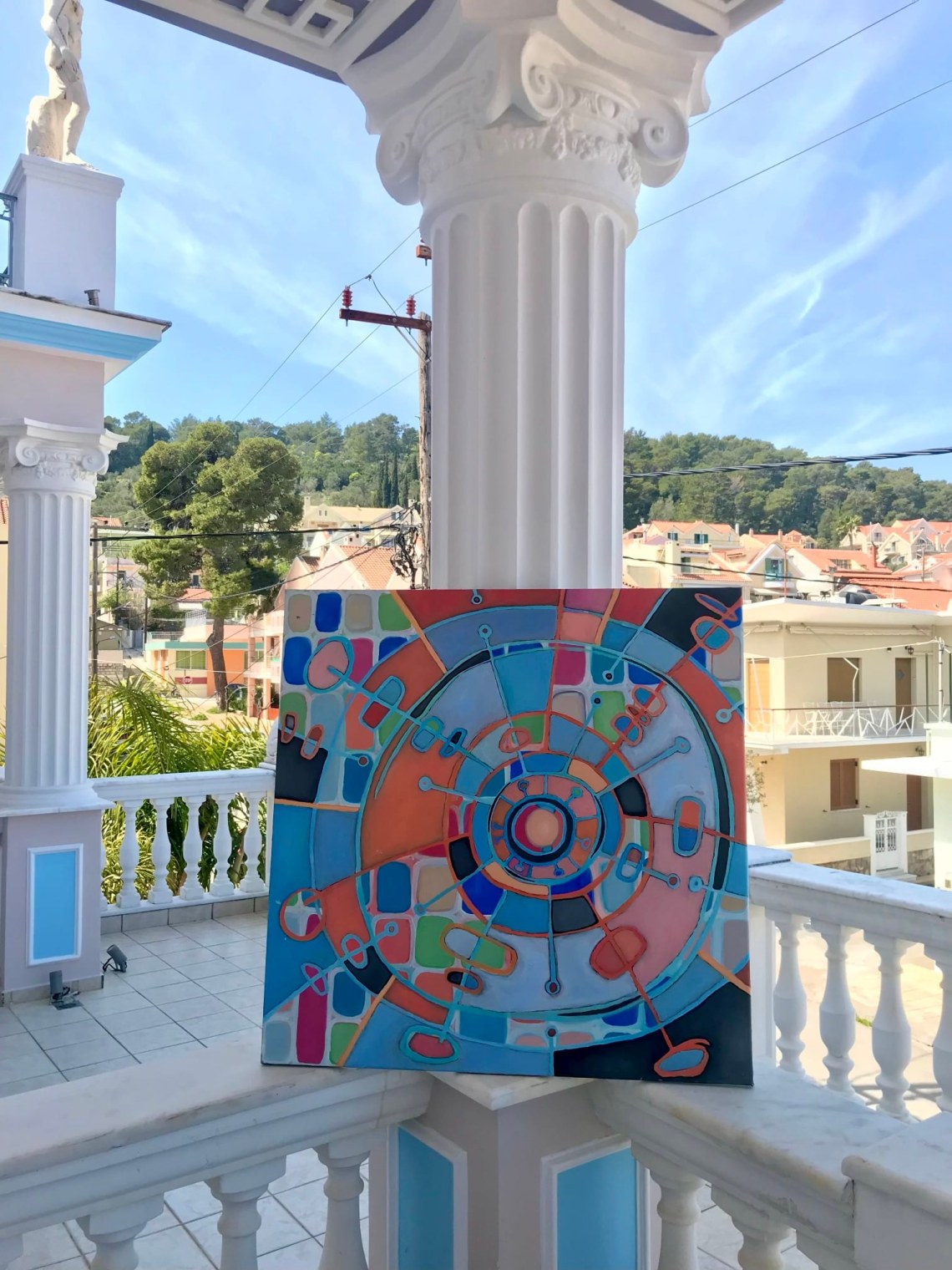 cosmic clock painting by holly troy in Greece